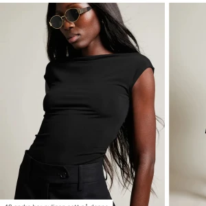 Populär topp från BIKBOK - Den perfekta lite finare bastoppen i mjukt och stretchigt material som är lite glansigt. Hög hals och djup rygg. Säljer pga blev för liten. ENDAST ANVÄND 1 GÅNG - jättefint skick! Nypris: 259kr