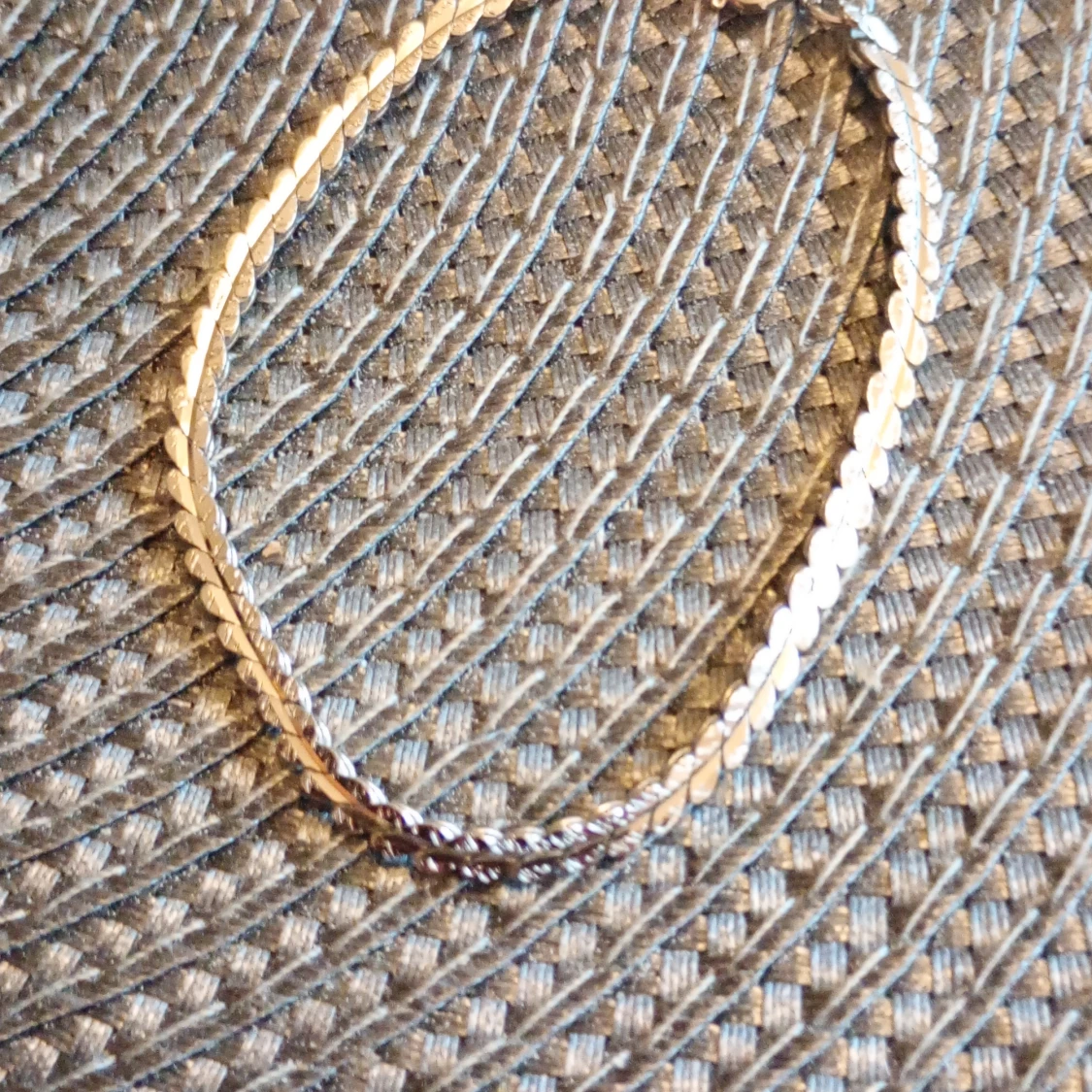 Armband silverfärgade mönster,20 cm.