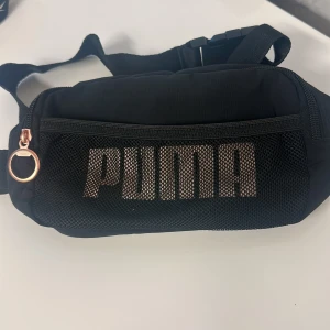 Magväska - Jag har använt den ett par gånger. Väldigt bekväm och lagom storlek 