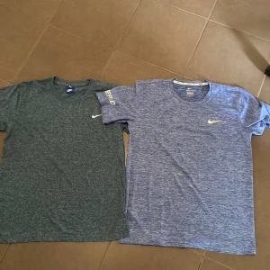 Nike träningströjor - Aldrig använda! Den gråa åt vänster är i storlek M. Den högra är såld.