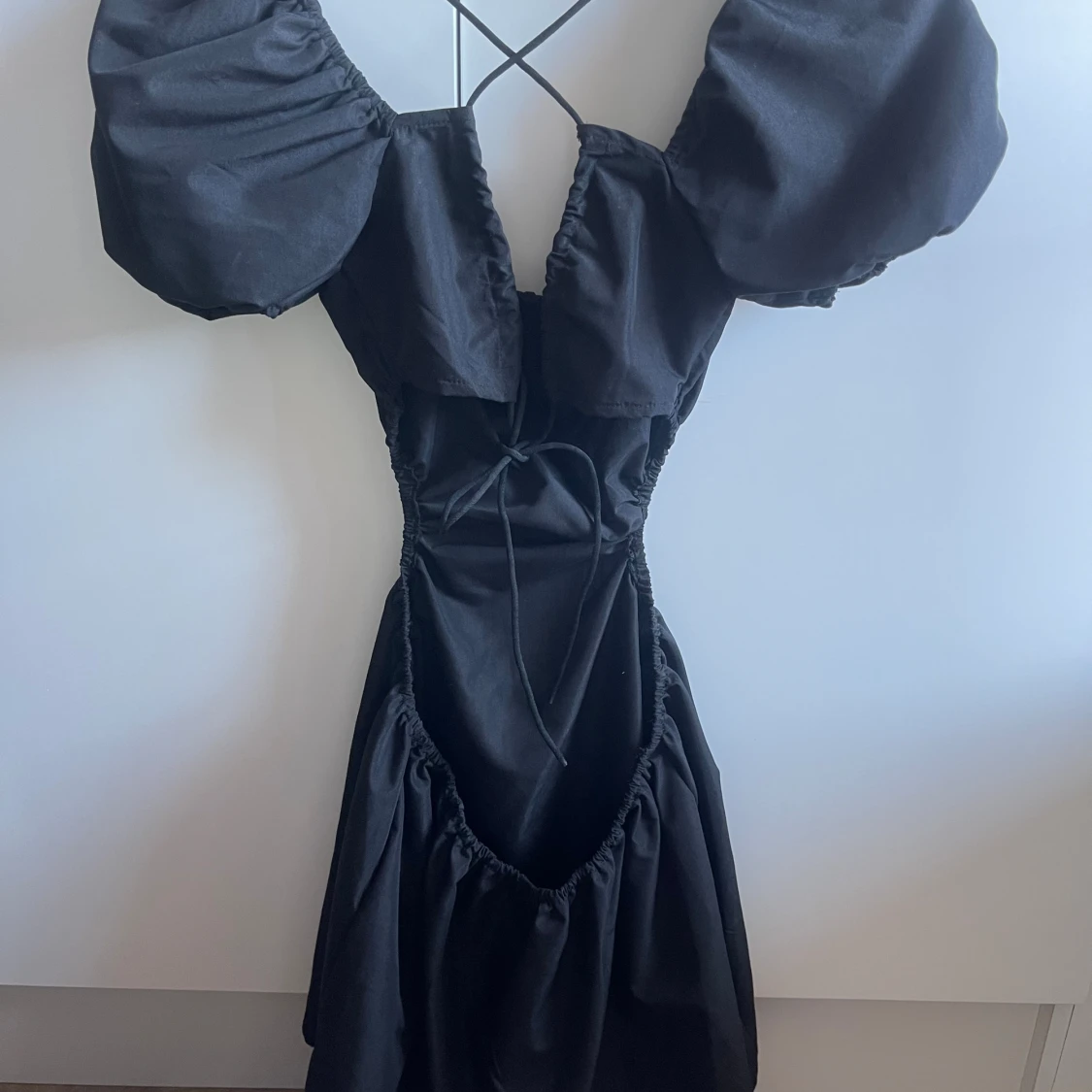 Öppenryggad klänning - 90