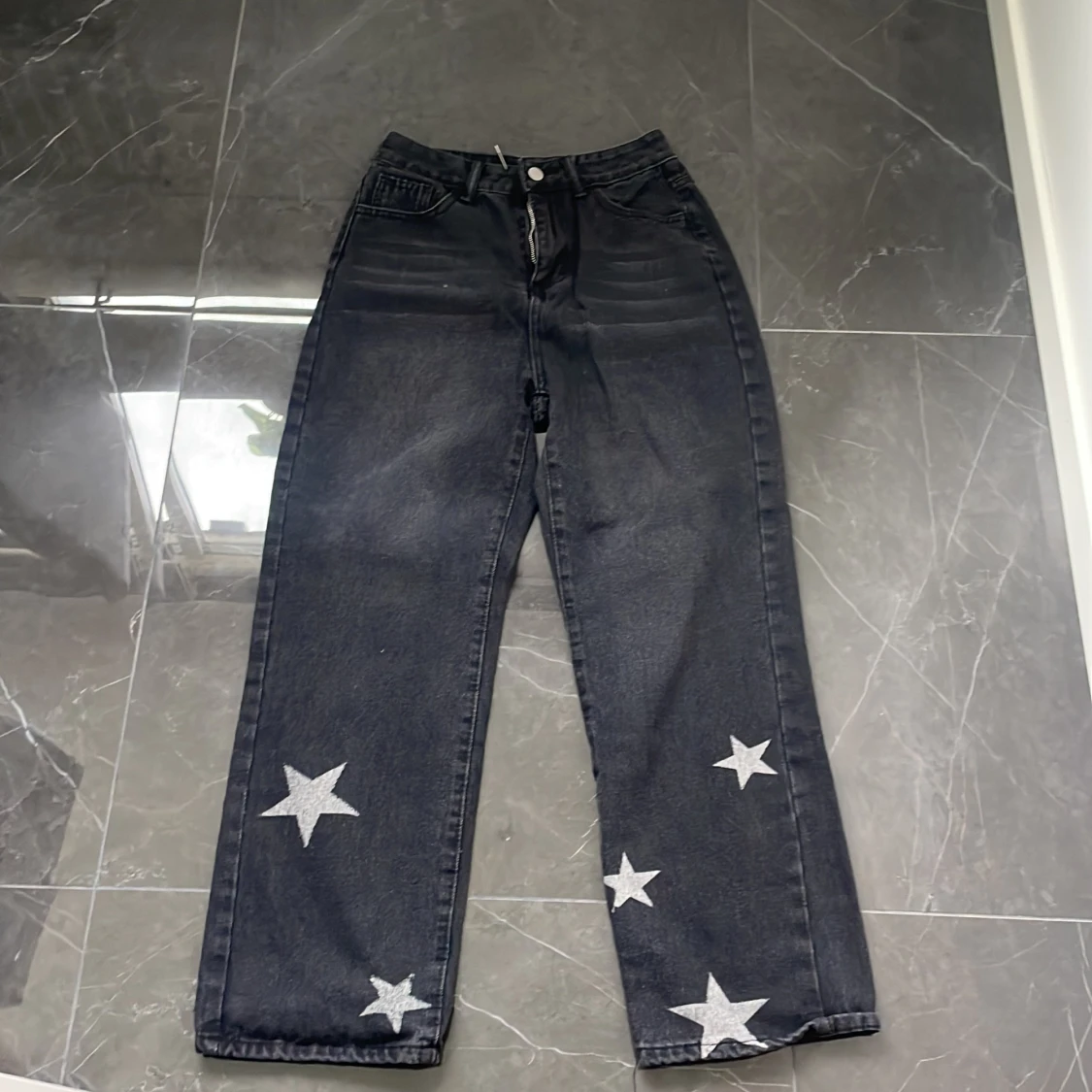 Svarta jeans med stjärnor - 90