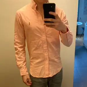 Snygg Ralph lauren skjorta i färgen orange, skick 9,5/10. Nypris 1595kr