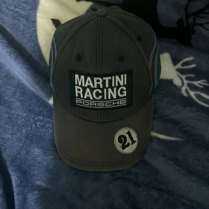 Martini racing Porsche caps  - Its a good caps and nice for like go out with you friends 