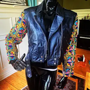 Size small and is true to size. Contempo was a very trendy shop in Los Angeles in the 80s. Jacket is in mint condition!