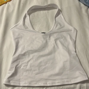 Halter top  - Storlek xs/34 men den är större i passform men den är bra matrial och fin