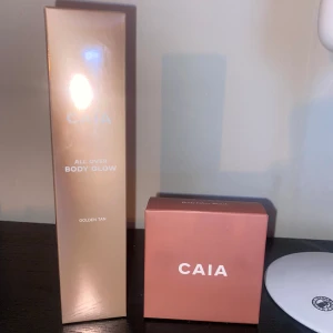 Caia body glow & brush - Body glow i färgen golden tan samt borste. Helt oöppnade. Säljer då jag råka köpa dubbelt. 