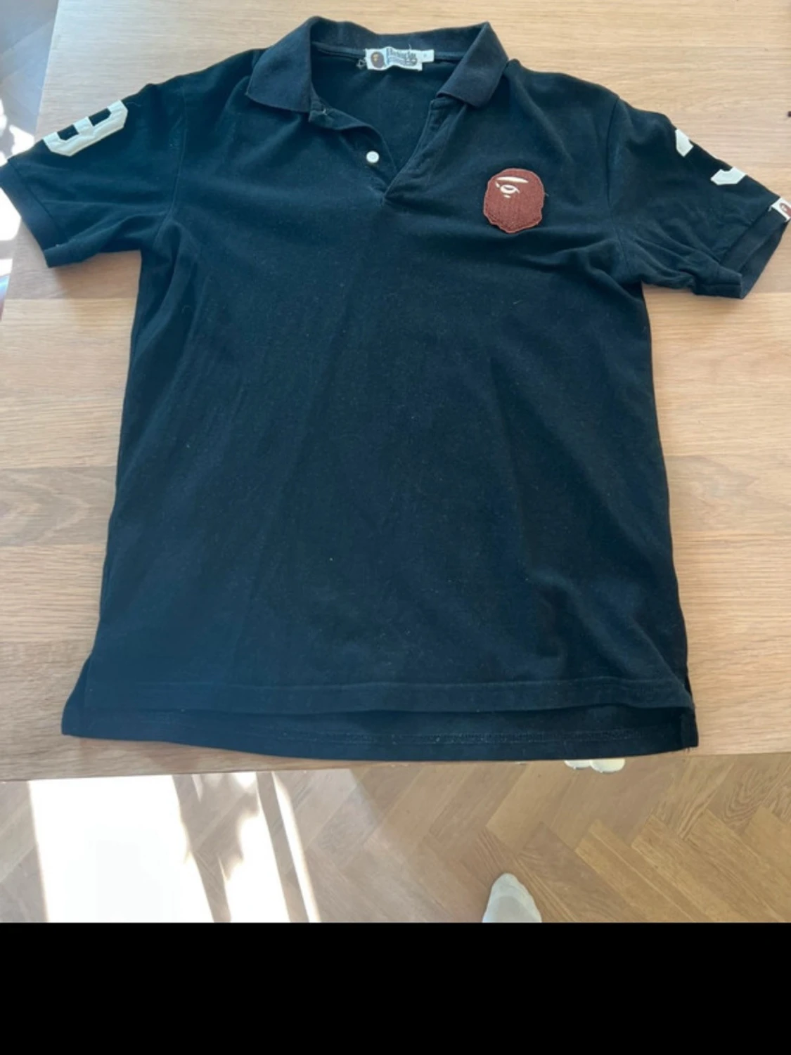 Svart BAPE pikétröja