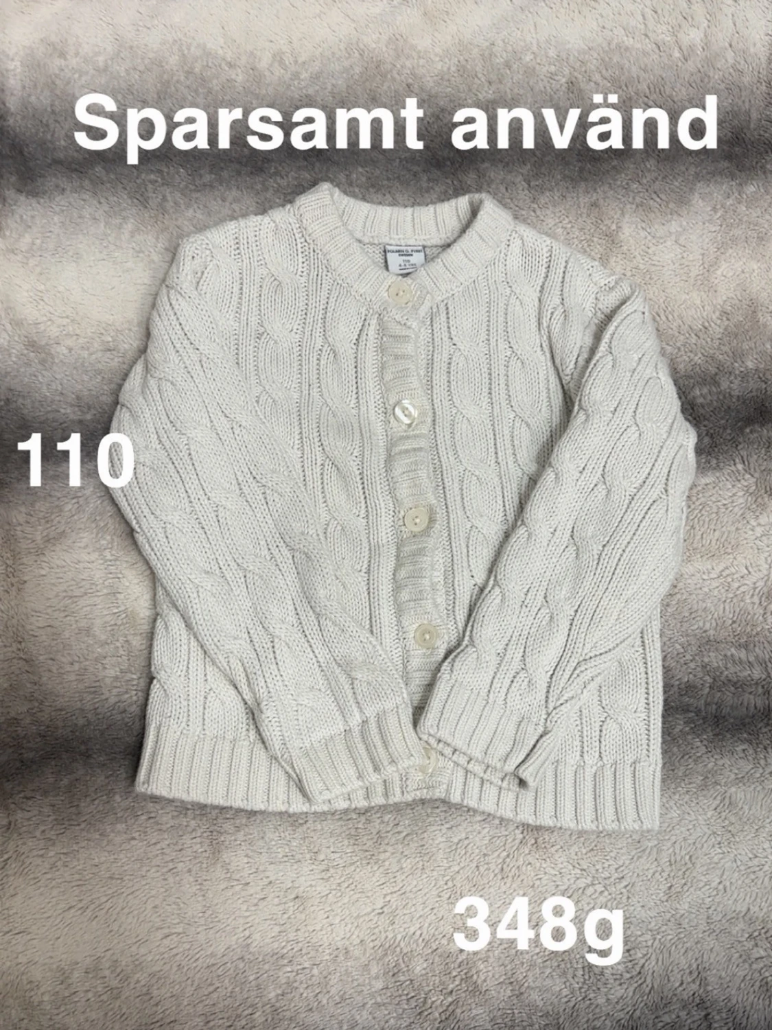 Vit kabelstickad kofta Polarn o pyret barn