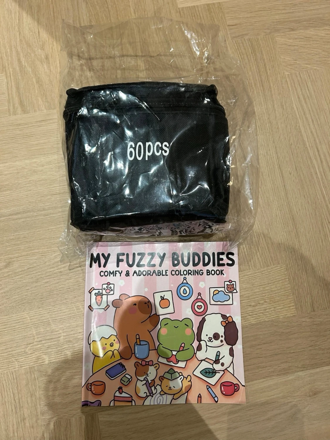 Pennor och en målarbok (går att köpa styck)