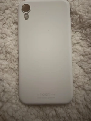 Vitt mobilskal från Holdit iPhone XR - Aldrig använt. Från holdit. 