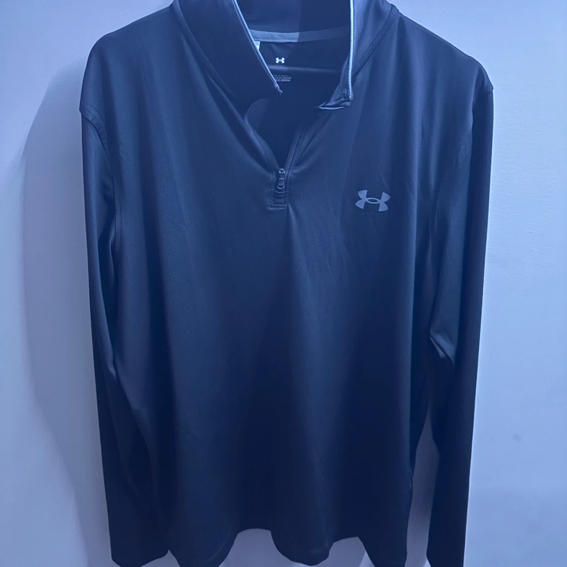 Svart långärmad träningströja Under Armour