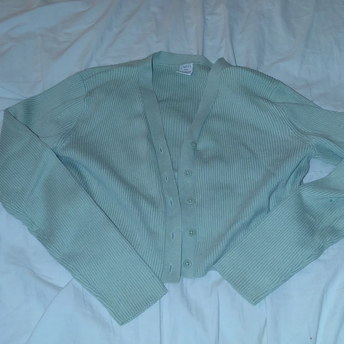 Ljusgrön ribbad kofta från Lindex