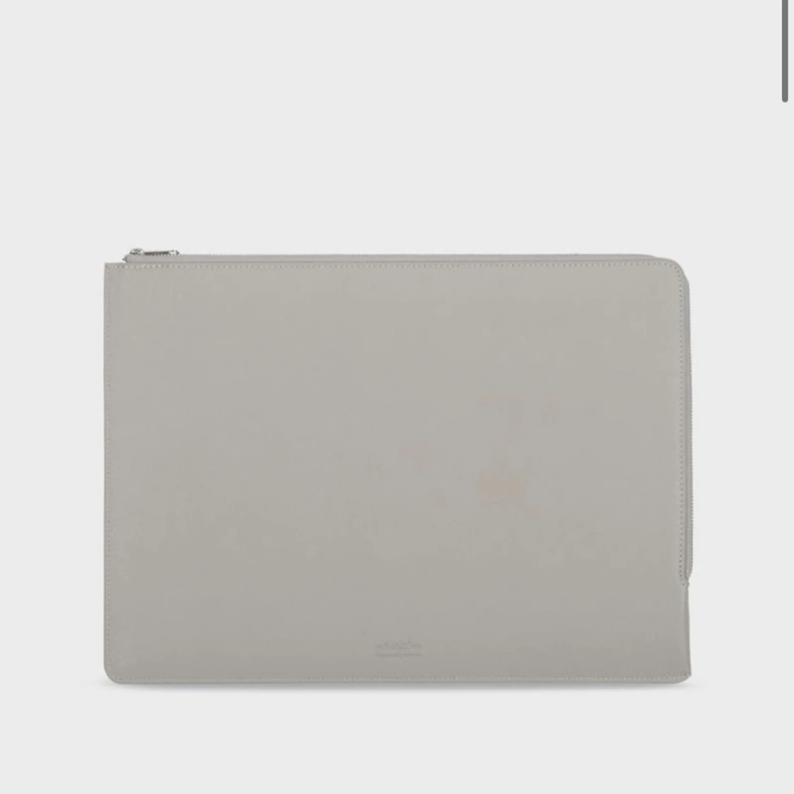 Grå datorväska i skinn från holdit