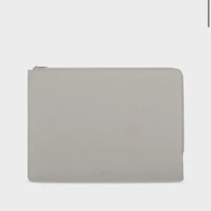 Grå datorväska i skinn från holdit - Säljer ett jätte fint ljus grått datafodral från holdit i skinn. De är aldrig använt. Köpt för 400. 