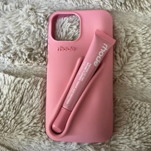 Rhode iPhone 13 - Aldrig använda . Lip tint + mobilskal 