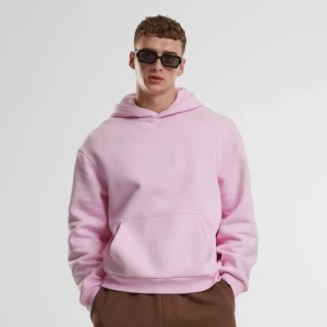 Ljusrosa hoodie från H&M - Ljusrosa hoodie från H&M i mjukt och bekvämt material. Avslappnad passform, perfekt för vardag och fritid.