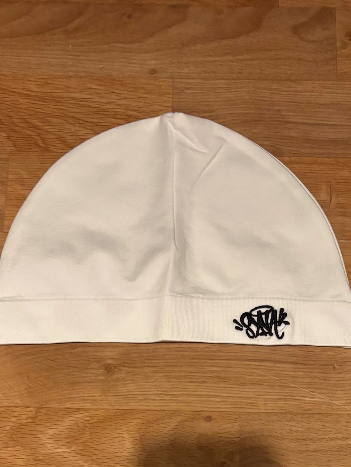 Vit Syna World mössa