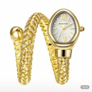 Guldig armbandsklocka Marlen Keller - Säljer en unik armbandsklocka från Marlen Keller med flätat, guldigt armband som snirklar sig runt handleden. Urtavlan är droppformad i silver med romerska siffror och gulddetaljer. Klockan har en riktigt lyxig och iögonfallande design.