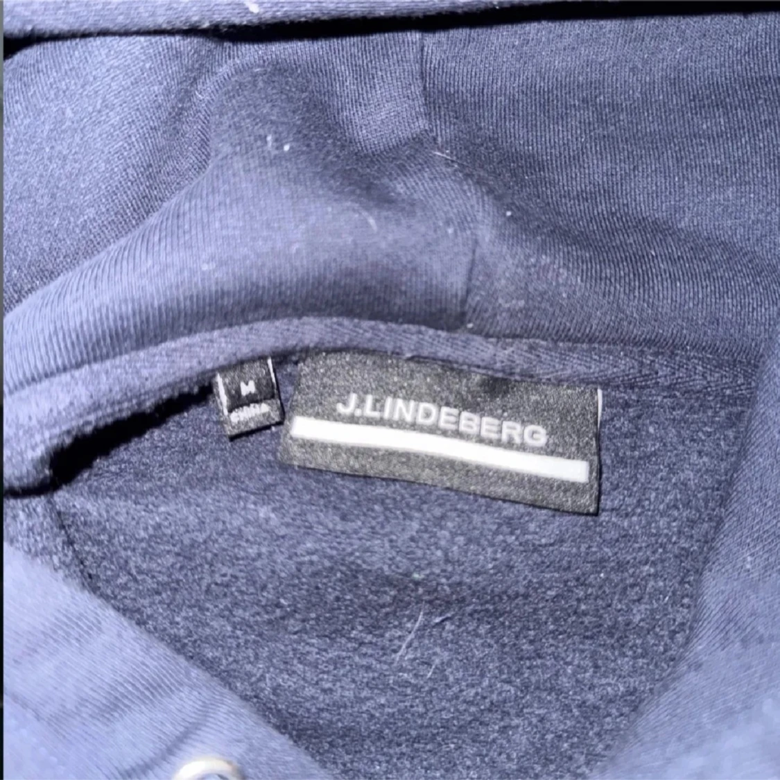 Mörkblå hoodie från J.Lindeberg - 1