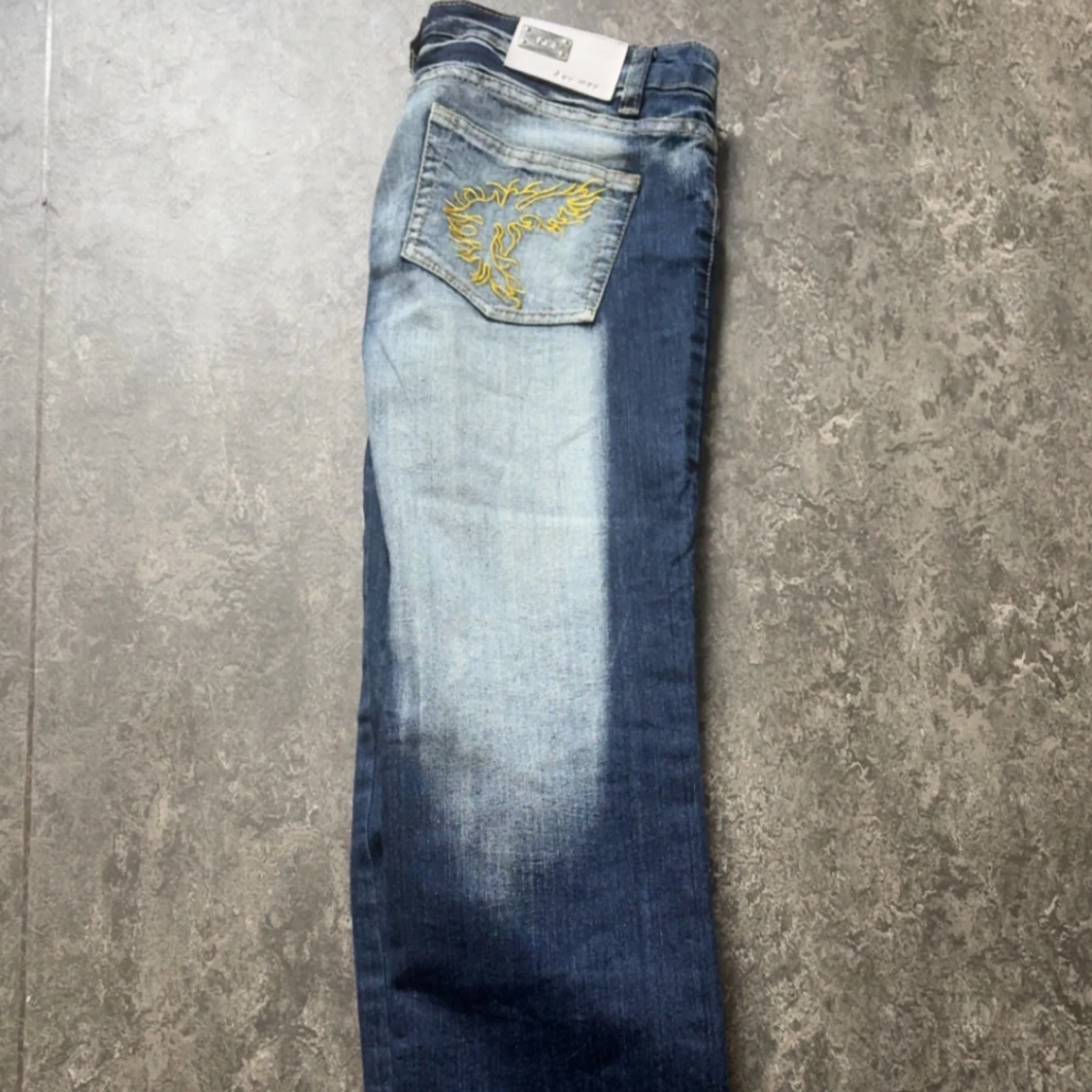 A pair of low waisted printed 2000s jeans S/M - 3