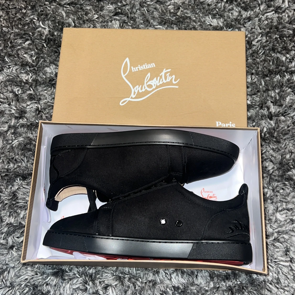 Svarta sneakers från Christian Louboutin - 1