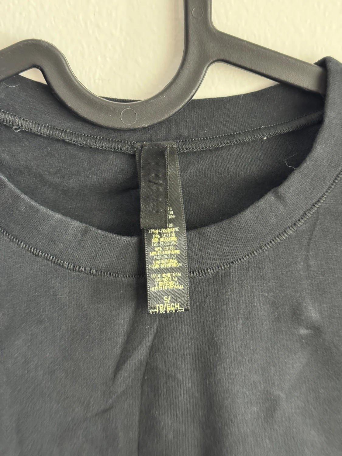 Svart slim fit långärmad topp från SKIMS - 1