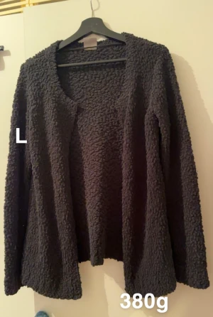 Mysig kofta utan knappar - Fint använt skick. Stl L