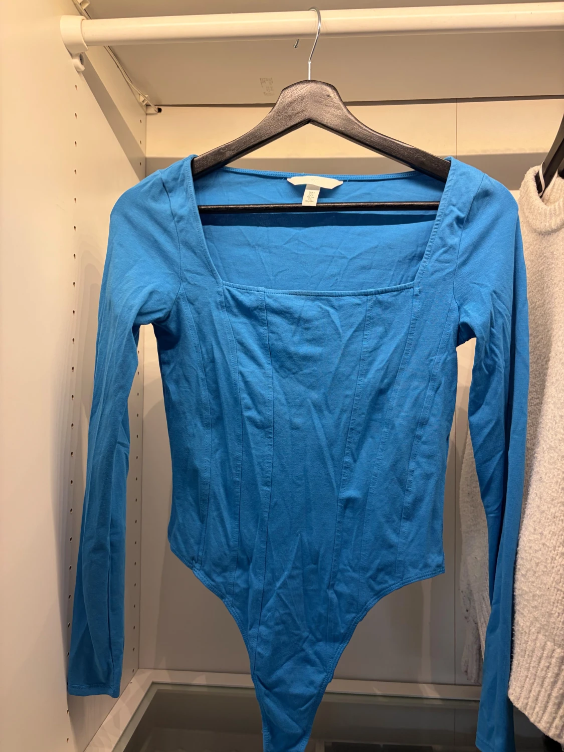 Blå långärmad bodysuit från H&M - 1
