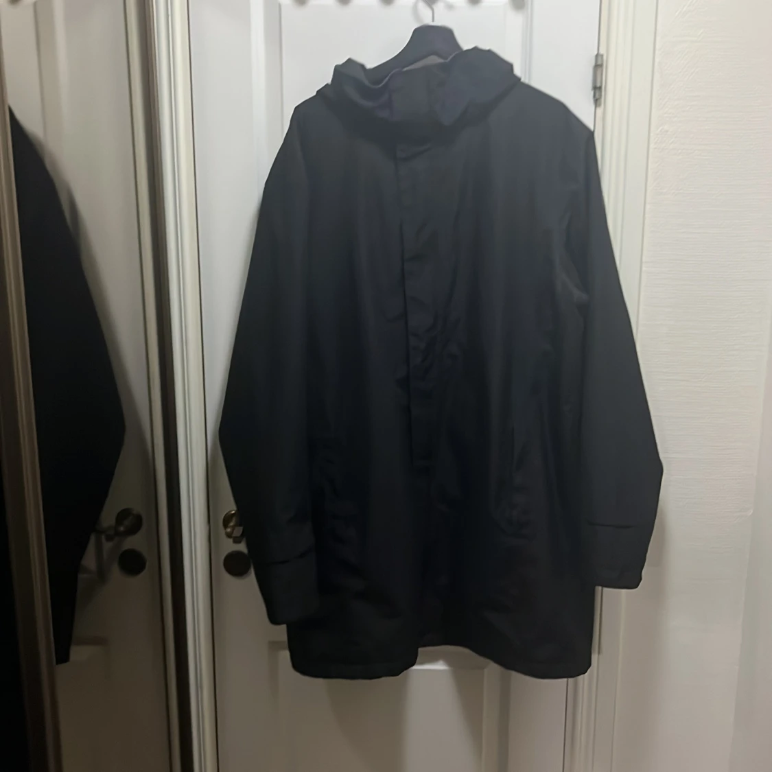 Svart regnjacka Helly Hansen XL