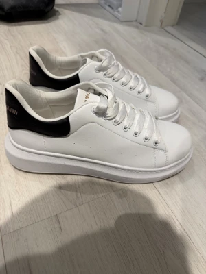 Alexander mcqueen white shoes - Used once or twice. Size says 45 but fits 44