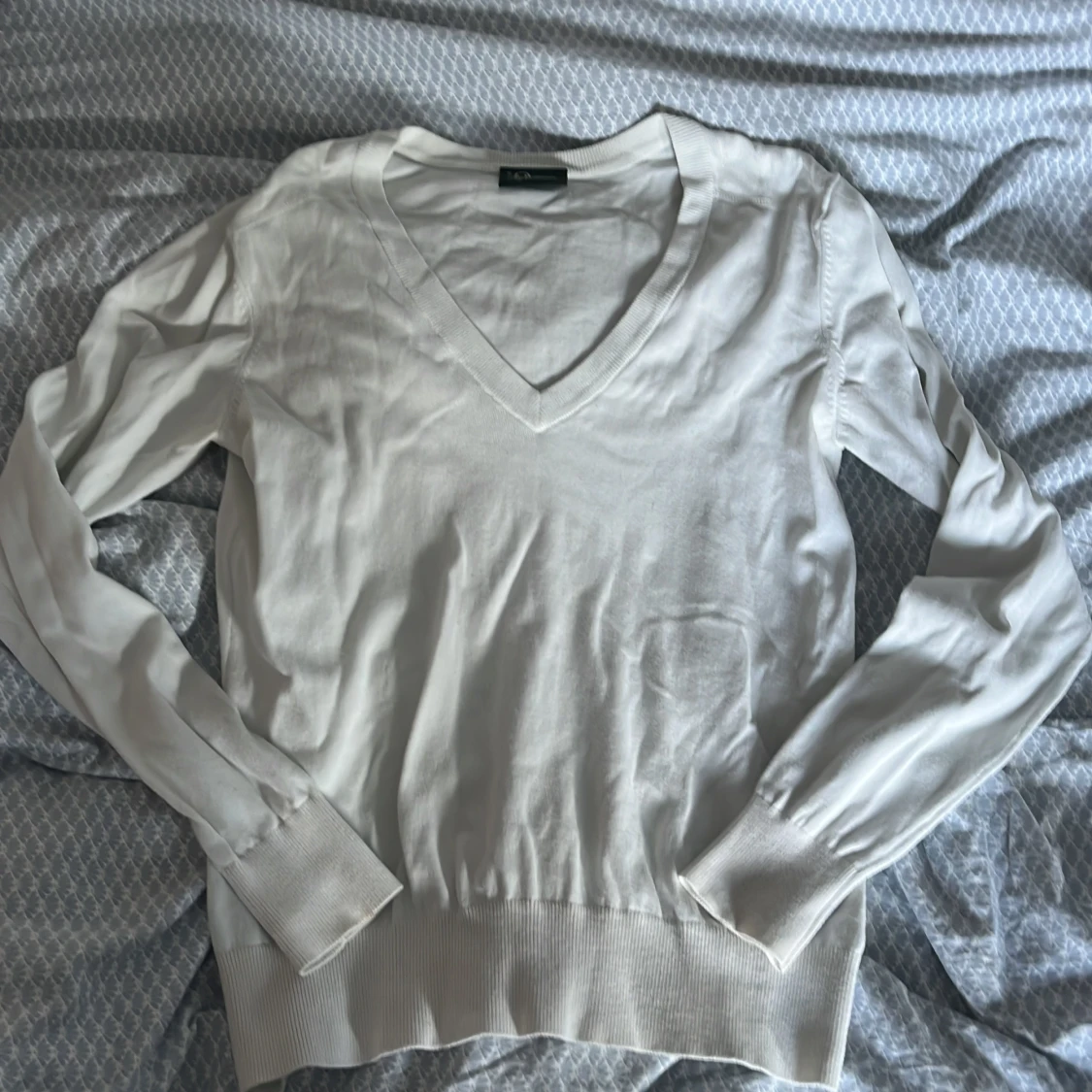 Vit v-ringad tröja Peak Performance