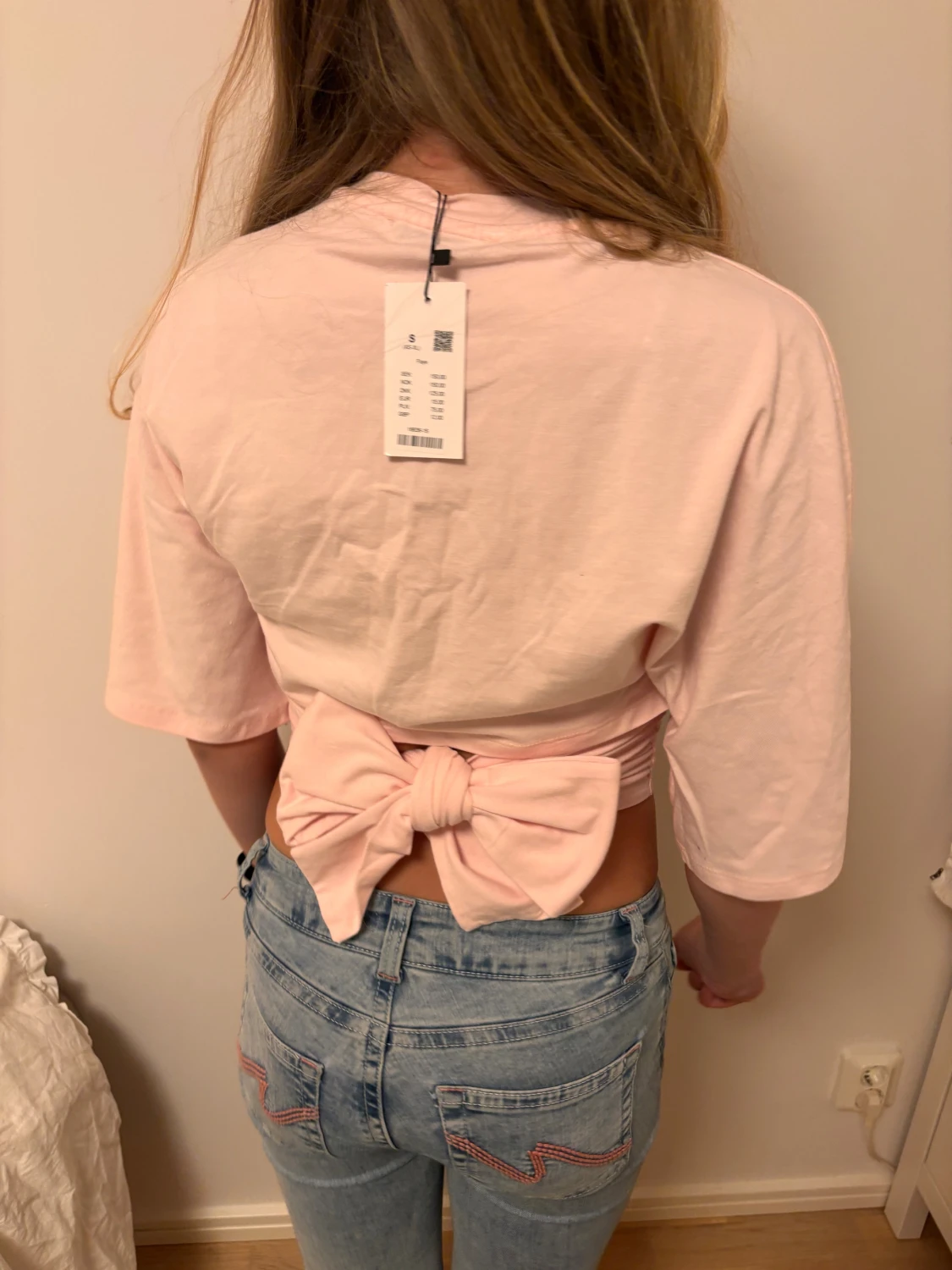 Ljusrosa croppad topp med rosett - 2