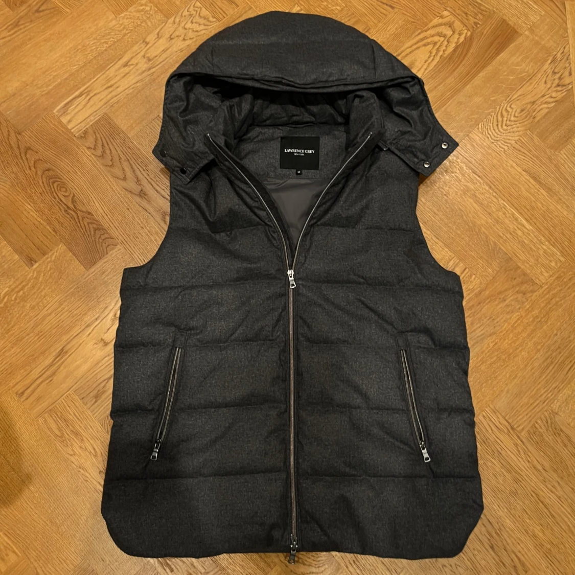 Grå puffervest från lawrence gray