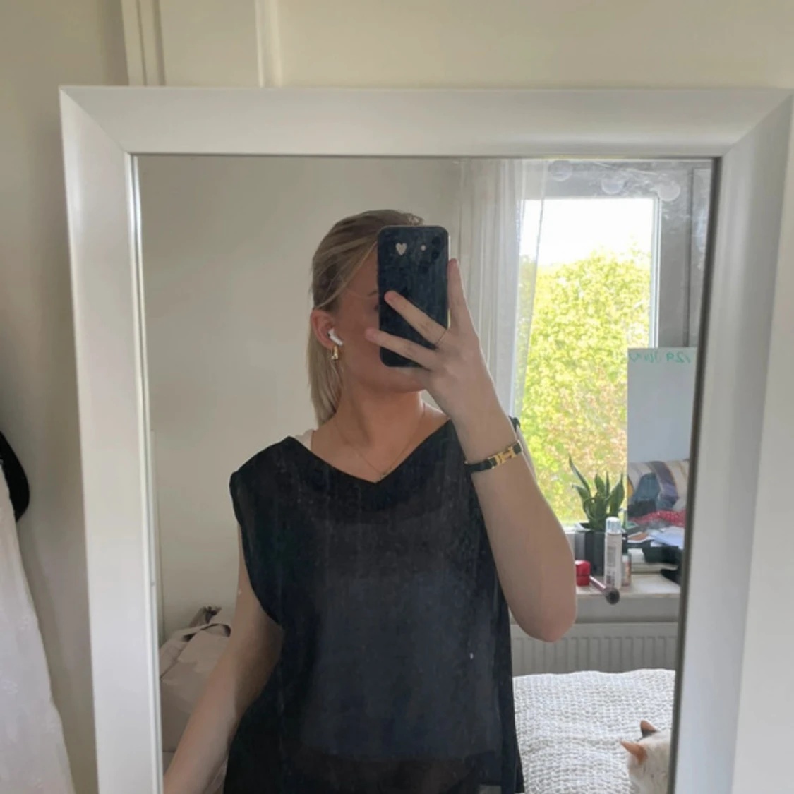 Svart transparent ärmlös blus