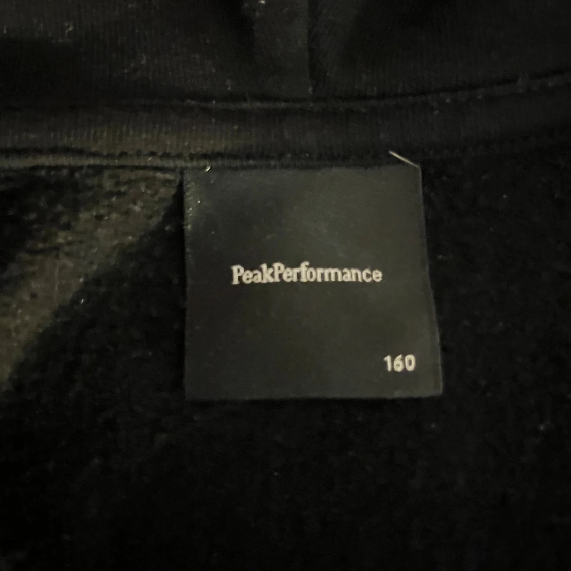 Svart hoodie från Peak Performance - 2