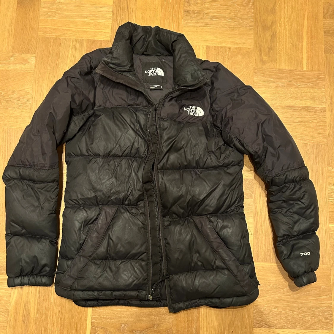 Svart pufferjacka från The North Face XS