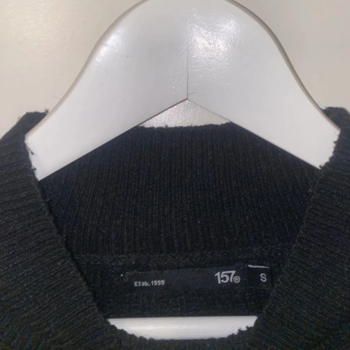 Svart stickad polotröja från 157 - 1