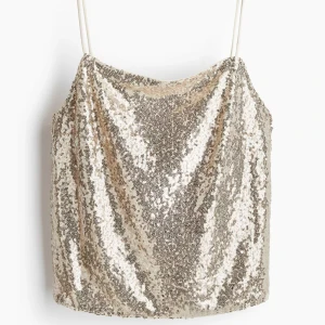 Glittrig paljettopp i guld - Jätte bra skick använd en gång på nyår, ord pris 99kr