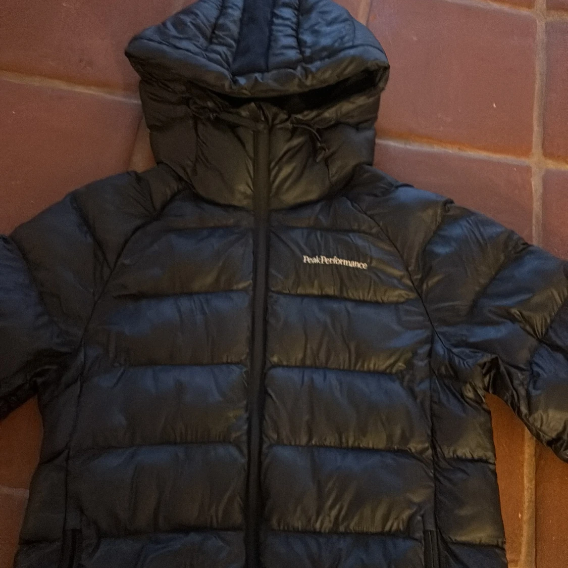 Svart dunjacka Peak Performance - 1