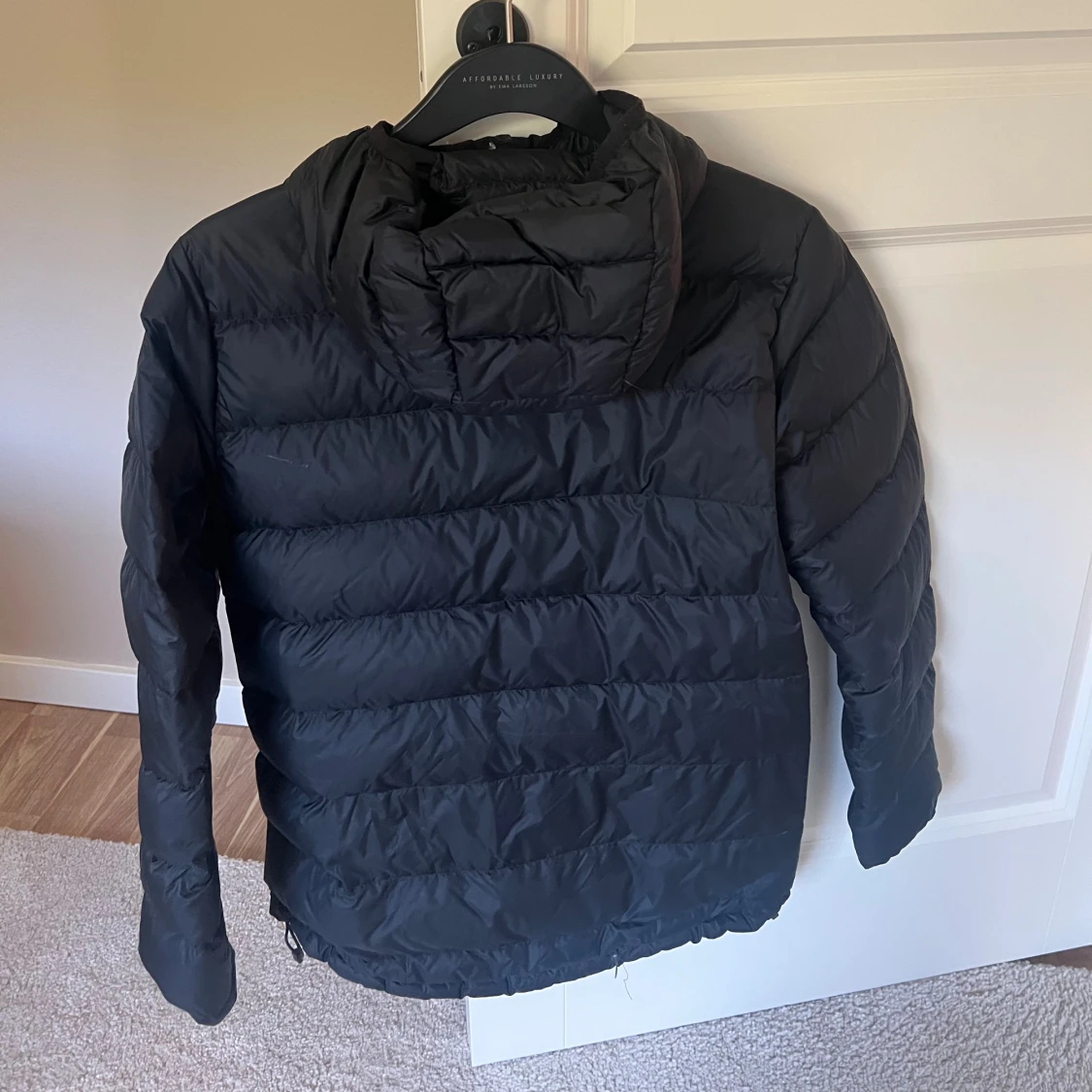 Svart dunjacka Peak Performance - 3