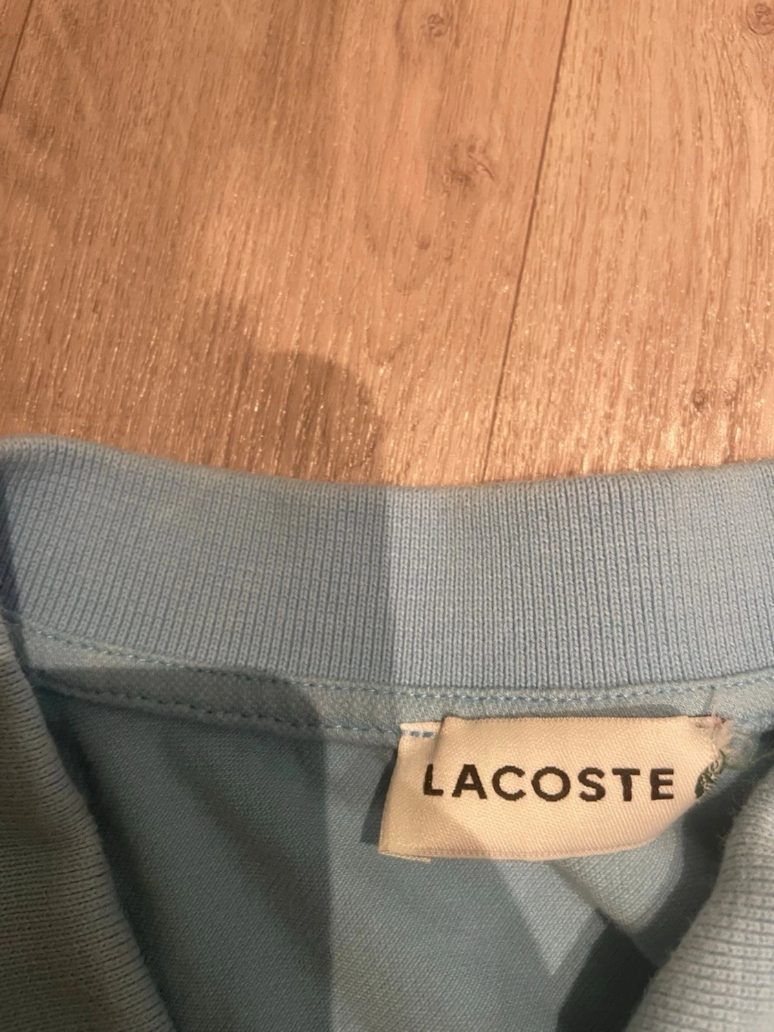 Ljusblå piké från Lacoste - 2