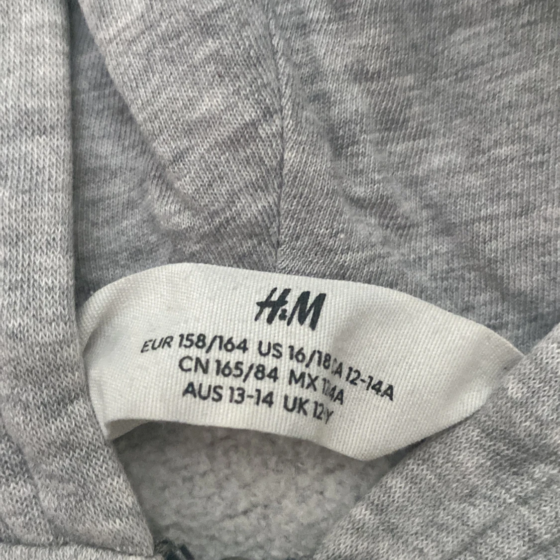Grå hoodie med dragkedja från H&M - 1