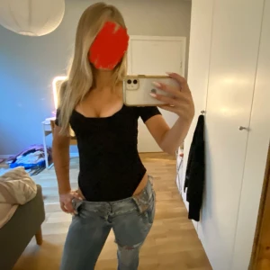 Svart body  - Jättesnygg svart body från Hm!