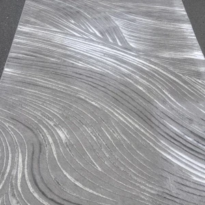 Designer Rug Collection - Design by Kim - Modern grå matta från Designer Rug Collection, Mönster med böljande linjer i olika grå nyanser. Tillverkad i 100% polyester, storlek 160x230 cm. Helt ny säljs för 700.