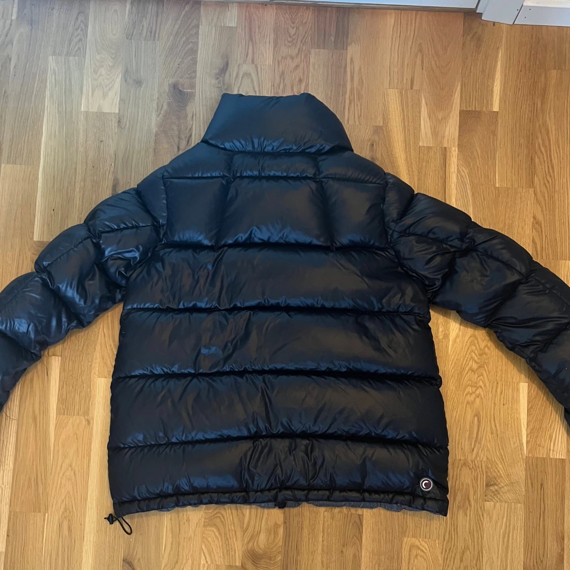 Svart/mörkblå pufferjacka från Colmar - 1