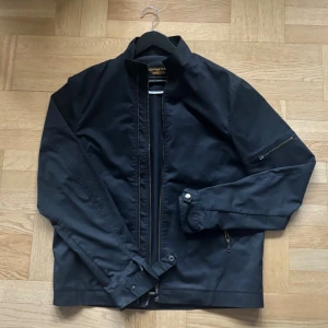 Svart vindjacka från koppartrans Sweden - Perfekt skick, fet vintage look, clean Storlek L men passar M