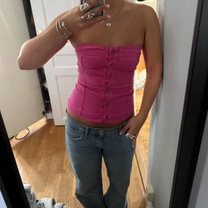Rosa jeanstopp - As ball jeans topp köpt secondhand! 