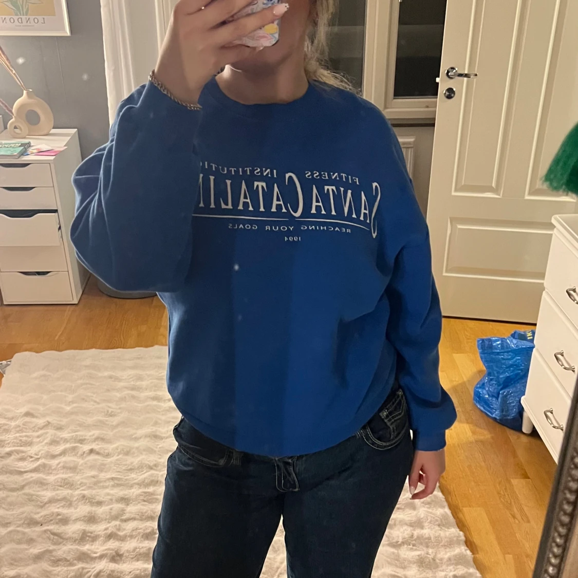 Blå sweatshirt från Gina Tricot