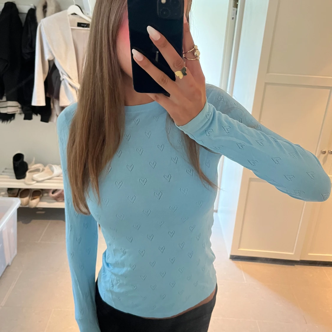 Ljusblå långärmad topp med hjärtmönster
